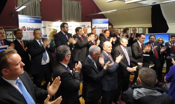 Candidates clap Tom Elliott at launch of UUP 2011 Assembly election manifesto in Linen Hall Library