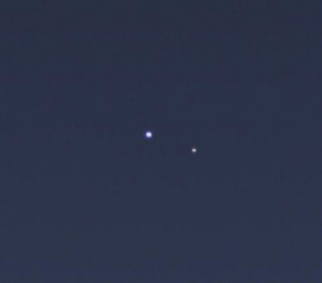 Magnified Cassini image of Earth and Moon