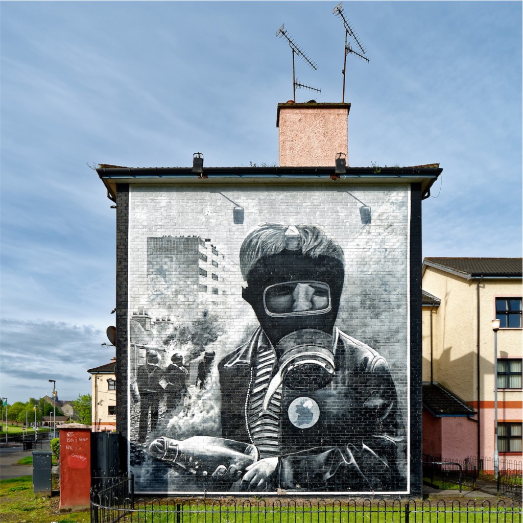 "The Petrol Bomber", as titled by the Bogside Artists. Bogside, Derry.