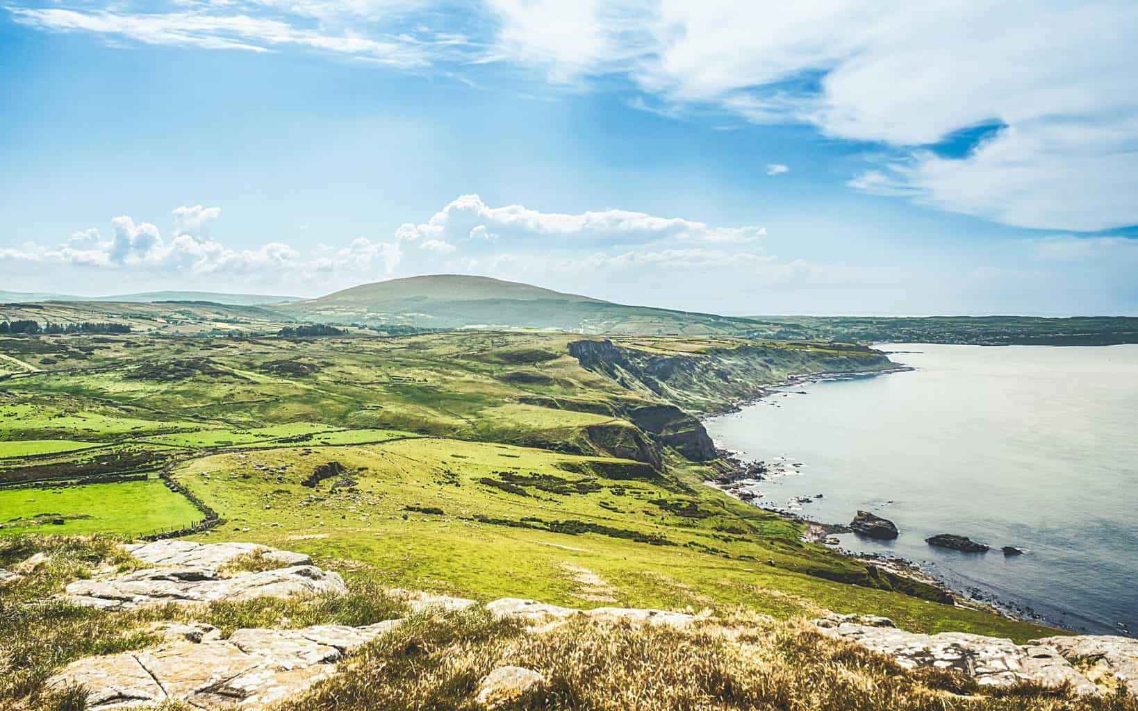 Looking out over The North Coast and the Glens of Antrim toward Ballycastle from Fair Head (Jun., 2020).