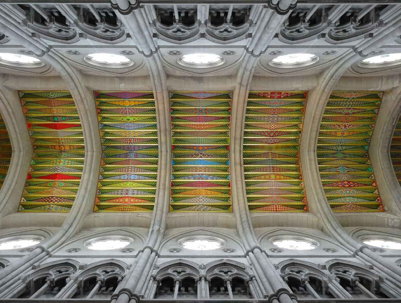 the ceiling of a cathedral with a colorful design