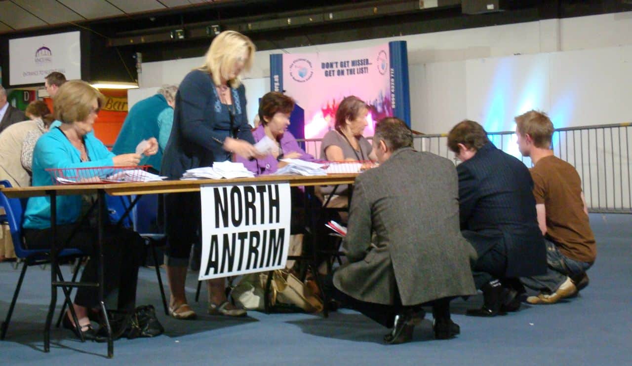 DUP's Ian Paisley (Junior) trying to tally the European election ballot papers (which must be placed upside down after verification) back in 2009 - photo by Alan Meban @alaninbelfast