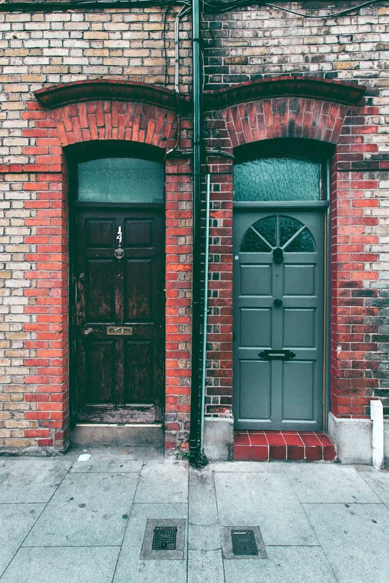 A vintage street scene in Dublin with classic brick doorways showcasing urban architecture.