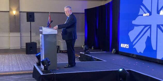 UUP leader Mike Nesbitt on stage at the party's 2025 conference